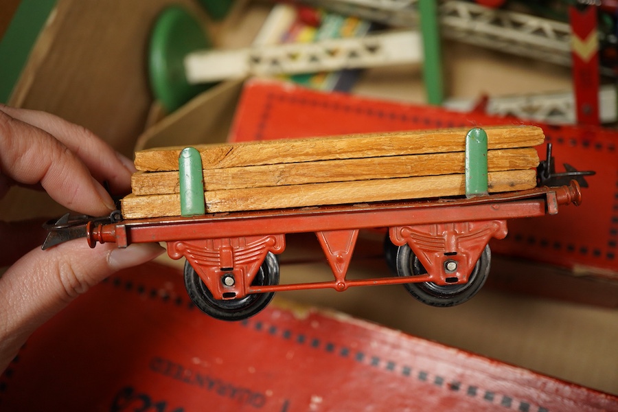 A collection of Hornby 0 gauge tinplate clockwork railway, including; a boxed No.1 Special GWR 0-4-0T locomotive, 5500, complete with original inner card packing pieces, etc., together with a boxed Dinky Toys No.1 Statio